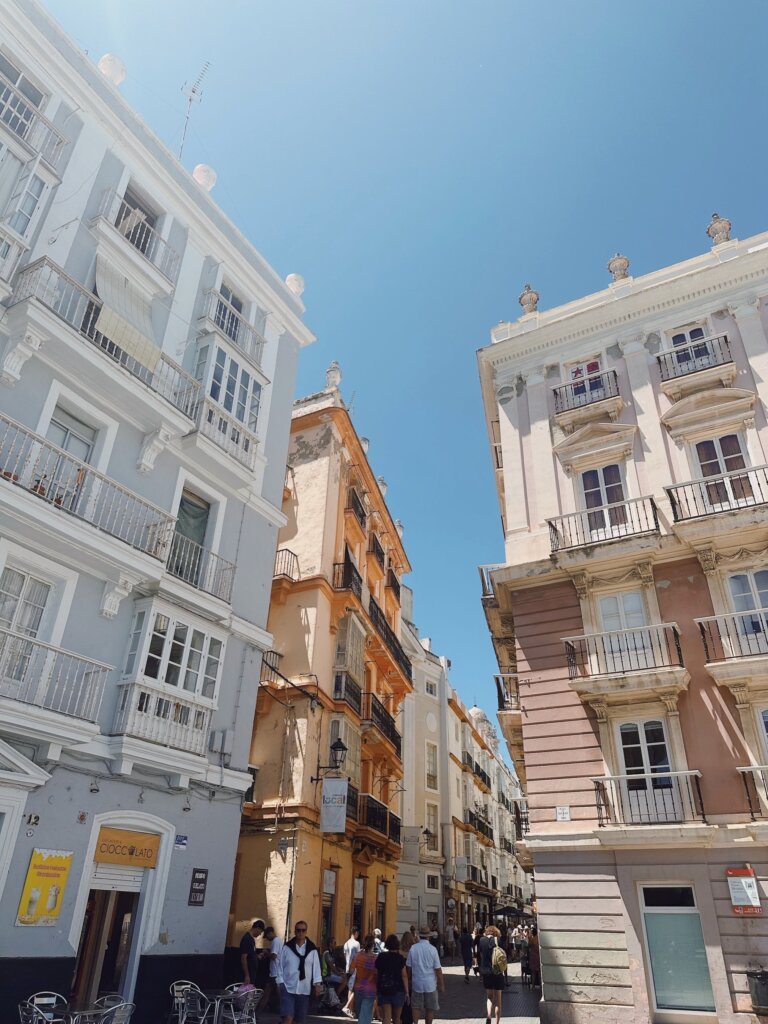 Cadiz city center with colorful buildings and blue sky and a must-visit city in Southern Spain.