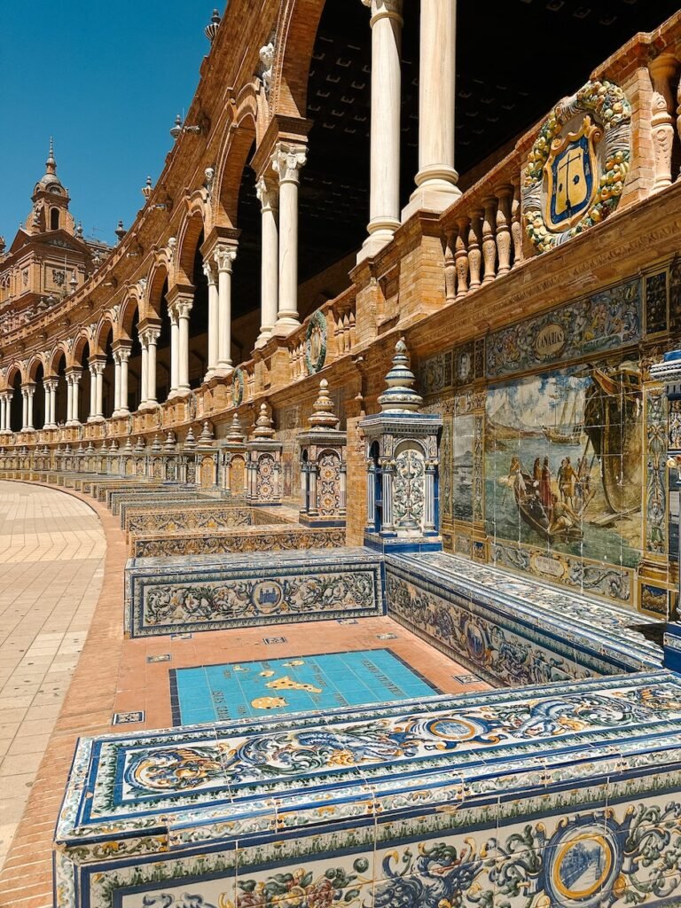 Colorful ceramic benches at Plaza de España, one of the top things to do in Seville, Spain.