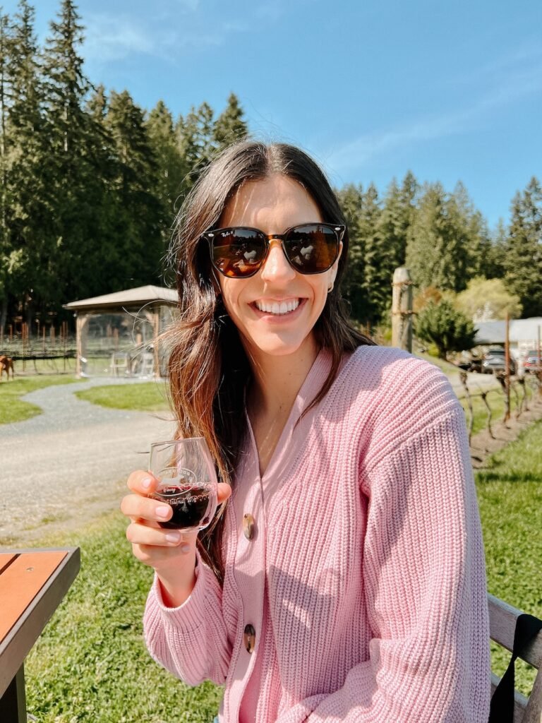 Pinot noir tasting setup under trees at Spoiled Dog Winery, Whidbey Island