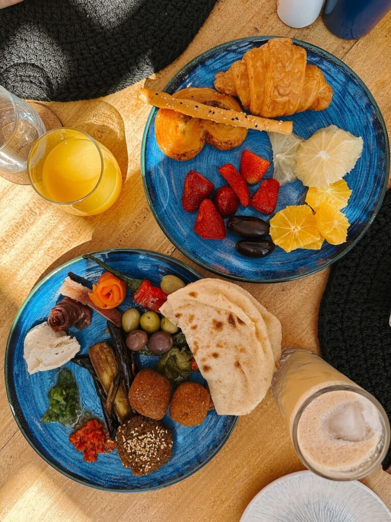 Traditional Egyptian breakfast mezze spread at The Chedi El Gouna, including fresh bread, dips, cheeses, and local specialties.
