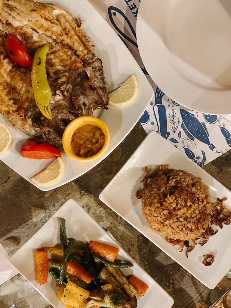 Grilled fish and seafood platter at The Fish Market El Gouna, a local restaurant in El Gouna marina known for fresh seafood.
