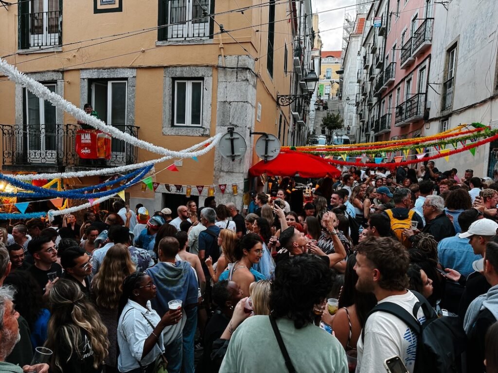 crowded streets during the Santos festival in Lisbon, Portugal