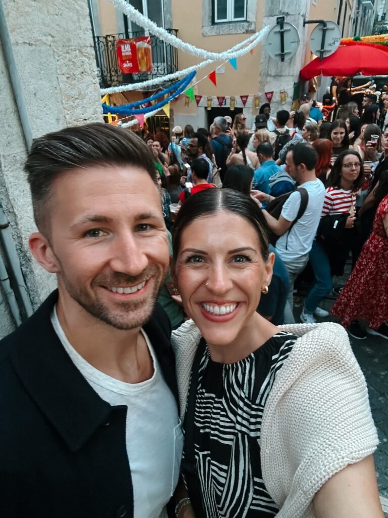two travelers exploring the Santos festival during 48 hours in lisbon, portugal