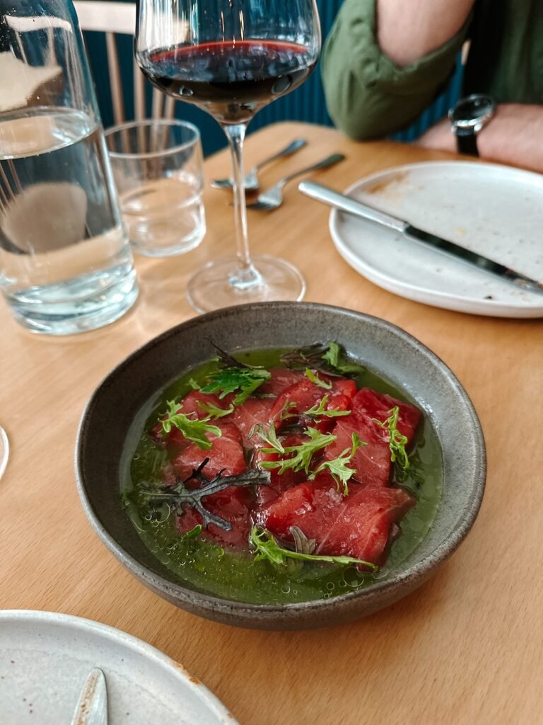 tuna in a green sauce at Prado restaurant in Lisbon that every traveler should check our during their 48 hours in lisbon, portugal
